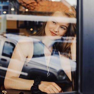 GARAGE BLACK SLEEVELESS ZIPPER BODYSUIT